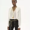 Blusa con volantes en georgette de seda Blusa con volantes en georgette de seda