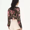 Blusa con volantes y cuello en V en charmeuse de seda Blusa con volantes y cuello en V en charmeuse de seda