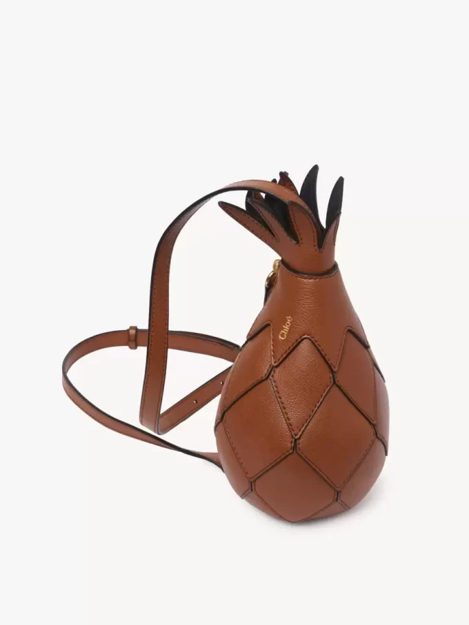 Bolso bandolera de piña en piel granulada Bolso bandolera de piña en piel granulada
