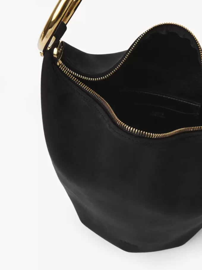 Bolso de mano pequeño tipo pulsera en piel de ante Bolso de mano pequeño tipo pulsera en piel de ante