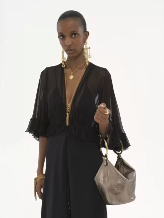 Bolso de mano pequeño tipo pulsera en piel metalizada Bolso de mano pequeño tipo pulsera en piel metalizada