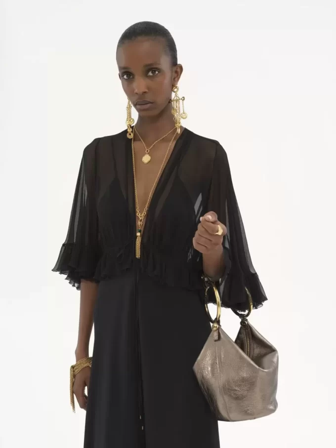 Bolso de mano pequeño tipo pulsera en piel metalizada Bolso de mano pequeño tipo pulsera en piel metalizada