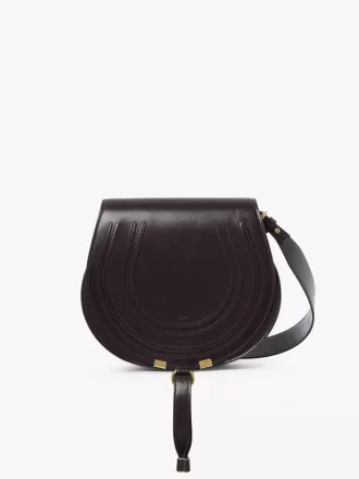 Bolso de sillín Marcie en piel brillante Bolso de sillín Marcie en piel brillante