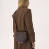 Bolso de sillín Marcie en piel brillante Bolso de sillín Marcie en piel brillante