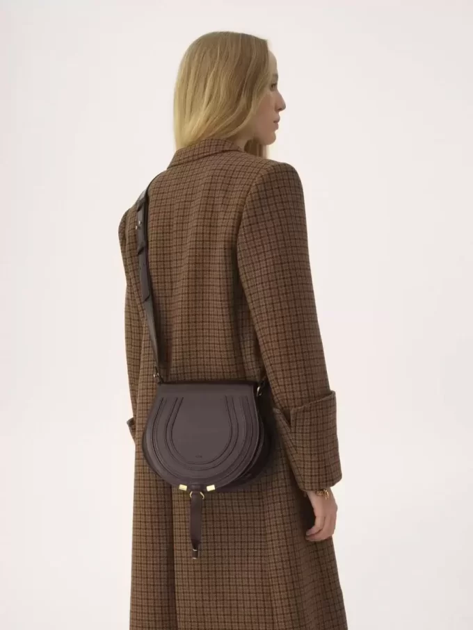 Bolso de sillín Marcie en piel brillante Bolso de sillín Marcie en piel brillante