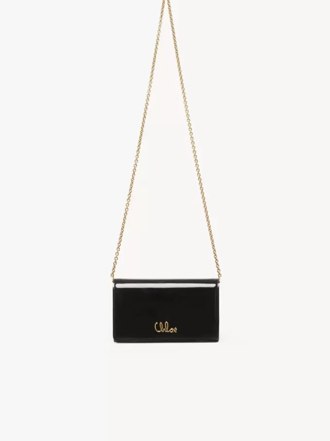 Cartera con solapa y cadena Chloé Iconic en charol Cartera con solapa y cadena Chloé Iconic en charol