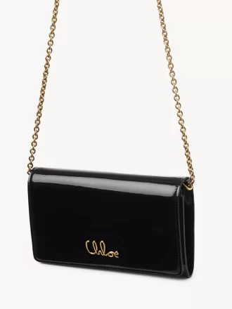 Cartera con solapa y cadena Chloé Iconic en charol Cartera con solapa y cadena Chloé Iconic en charol