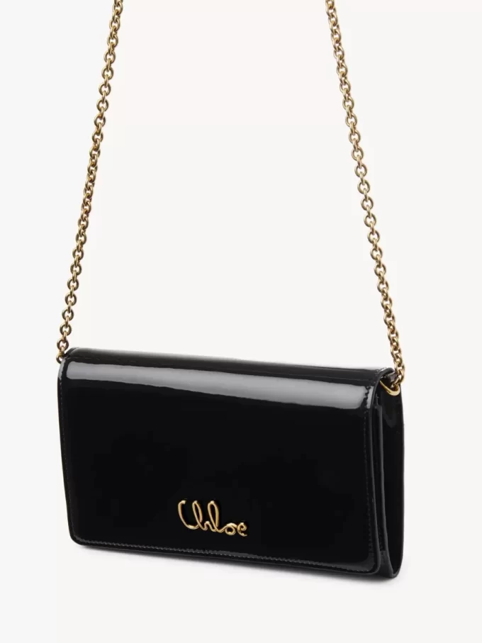 Cartera con solapa y cadena Chloé Iconic en charol Cartera con solapa y cadena Chloé Iconic en charol