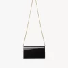 Cartera con solapa y cadena Chloé Iconic en charol Cartera con solapa y cadena Chloé Iconic en charol