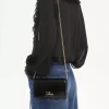 Cartera con solapa y cadena Chloé Iconic en charol Cartera con solapa y cadena Chloé Iconic en charol
