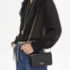 Cartera con solapa y cadena Chloé Iconic en charol Cartera con solapa y cadena Chloé Iconic en charol