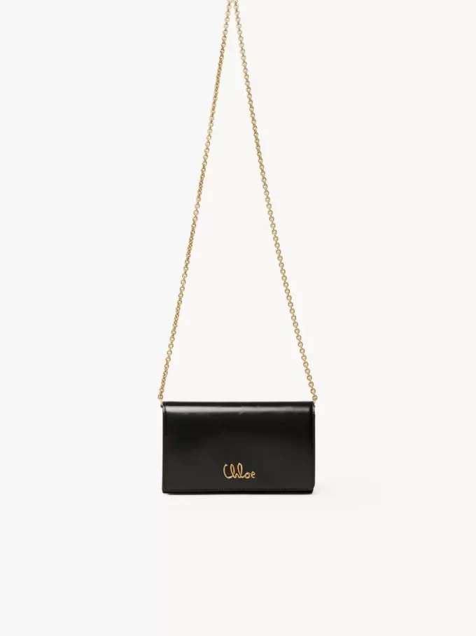 Cartera con solapa y cadena Chloé Iconic en piel brillante Cartera con solapa y cadena Chloé Iconic en piel brillante