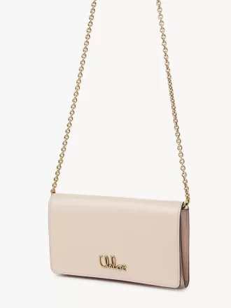 Cartera con solapa y cadena Chloé Iconic en piel brillante Cartera con solapa y cadena Chloé Iconic en piel brillante