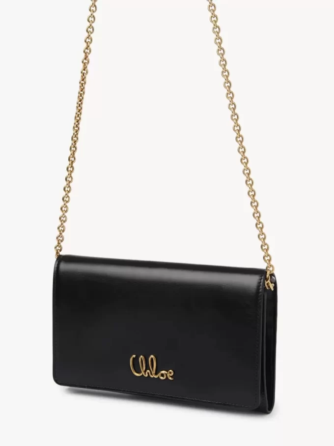 Cartera con solapa y cadena Chloé Iconic en piel brillante Cartera con solapa y cadena Chloé Iconic en piel brillante