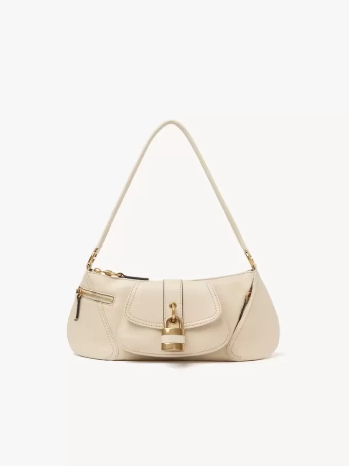 El bolso de hombro 99 en piel granulada El bolso de hombro 99 en piel granulada